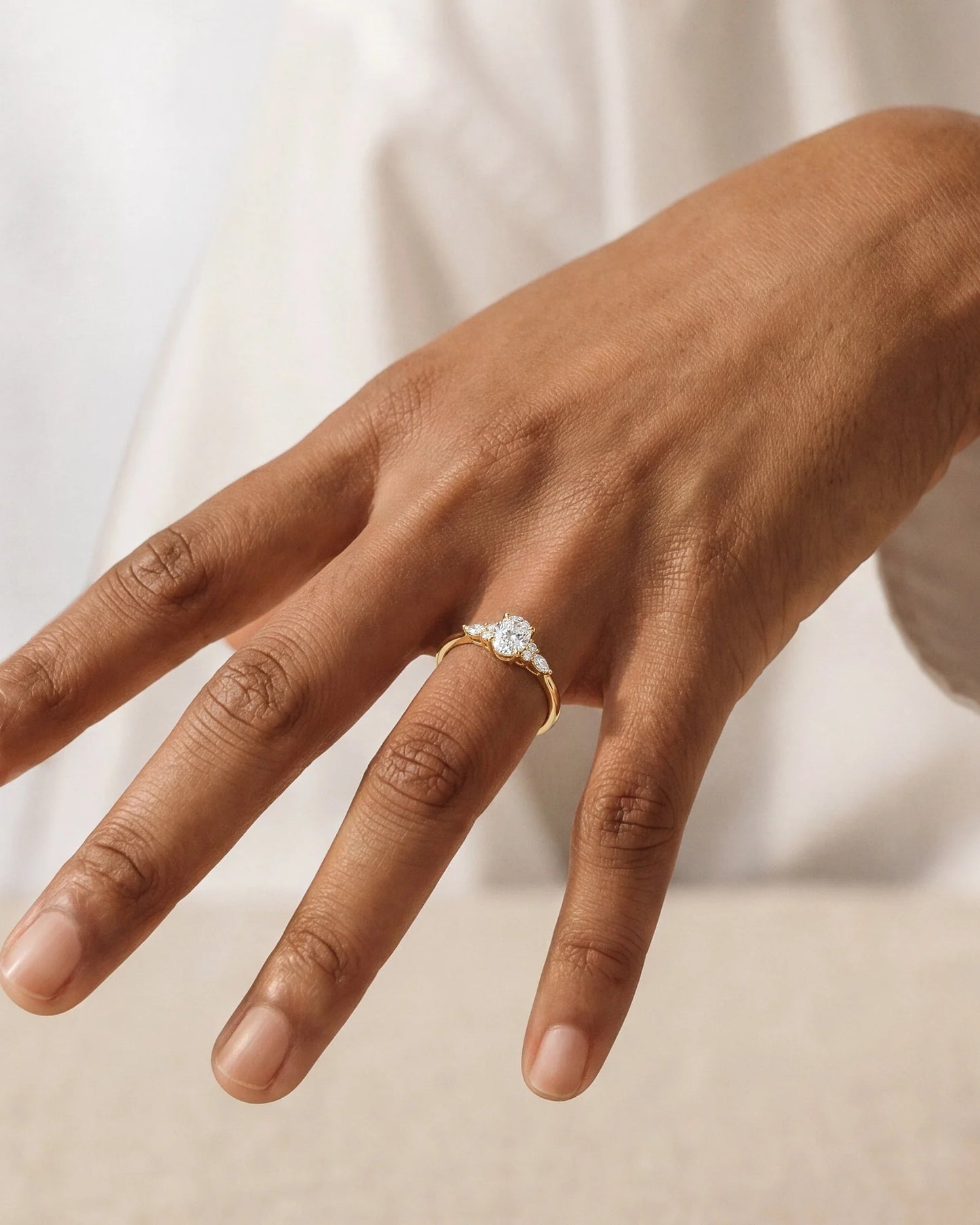 Oval Cut Cluster Accent Ring