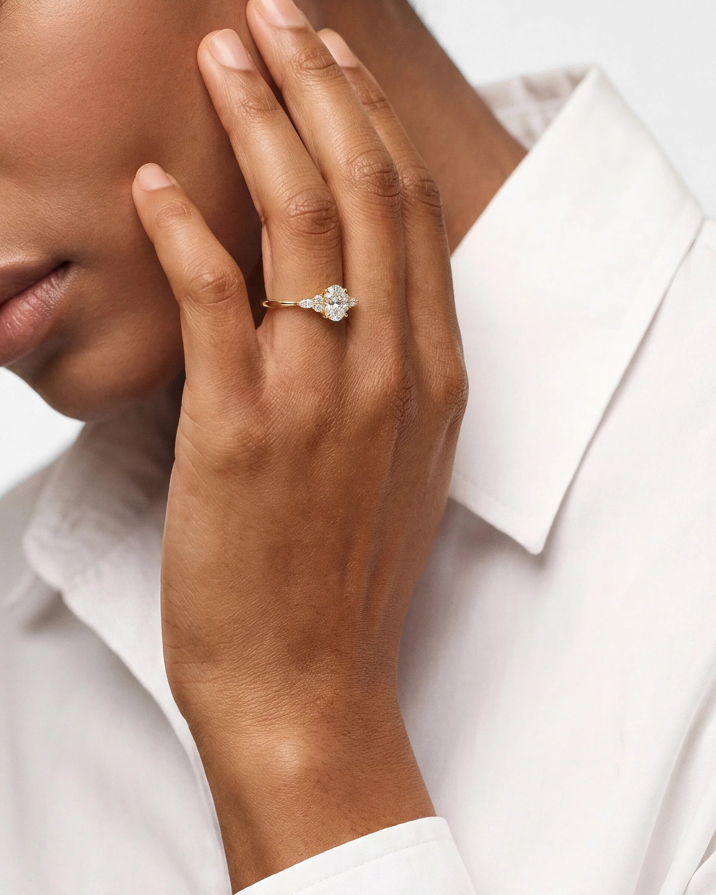 Oval Cut Cluster Accent Ring