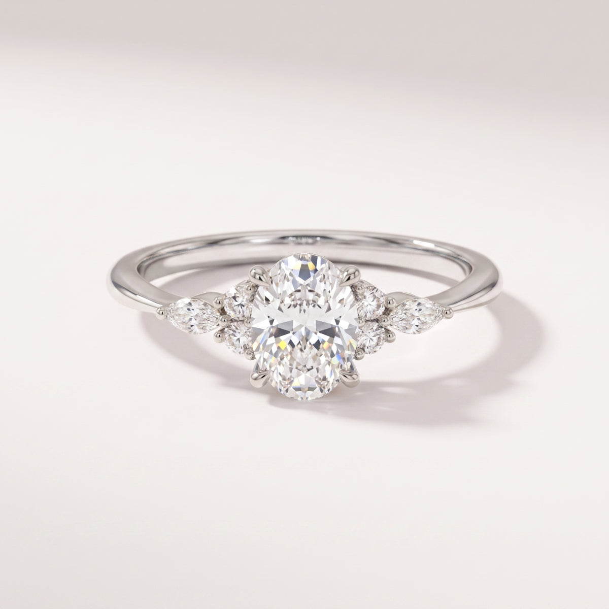 Oval Cut Cluster Accent Ring